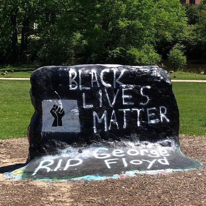 MSU's rock painted black with the words Black Lives Matter, R.I.P. George Floyd painted on them with the raised fist of solidarity