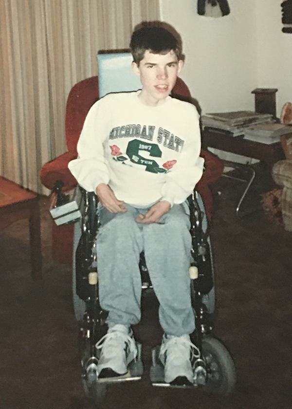 Sean Healey in his motorized wheelchair