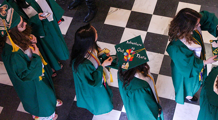 graduates line up at the Fairchild theatre