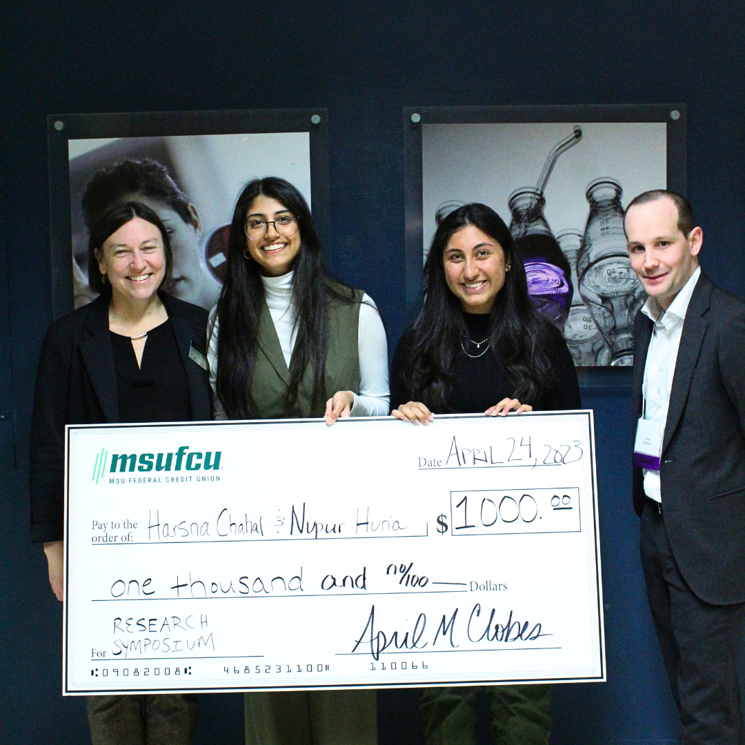 Grand Prize Award winners Harsna Chahal and Nupur Huria with Dean Cheruvelil and Jacob Watkins of MSUFCU
