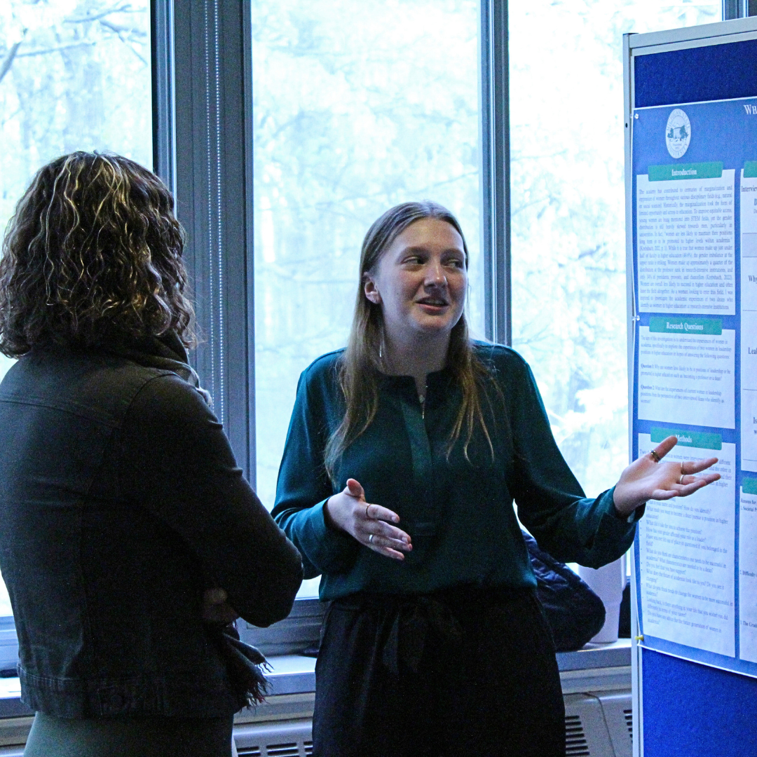 a student presents research at the 2023 research symposium