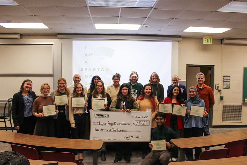 the dean, judges, winners, and Dr. Isaac Record