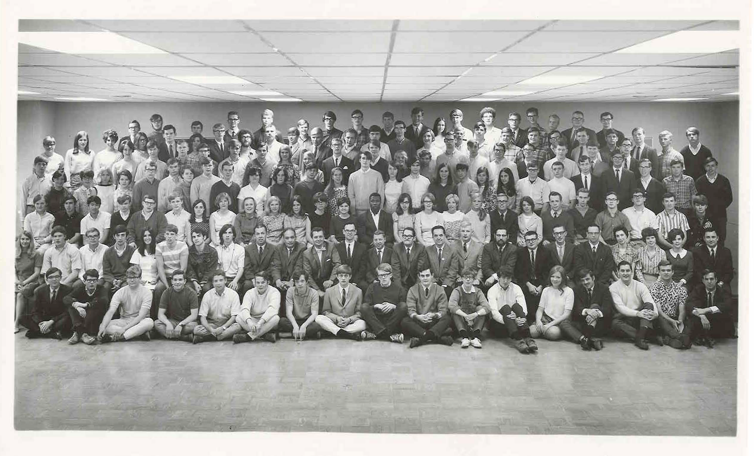 black and white photo from 1971 depicting 76 members of the inaugural graduating class of 1971, along with LBC faculty and staff.
