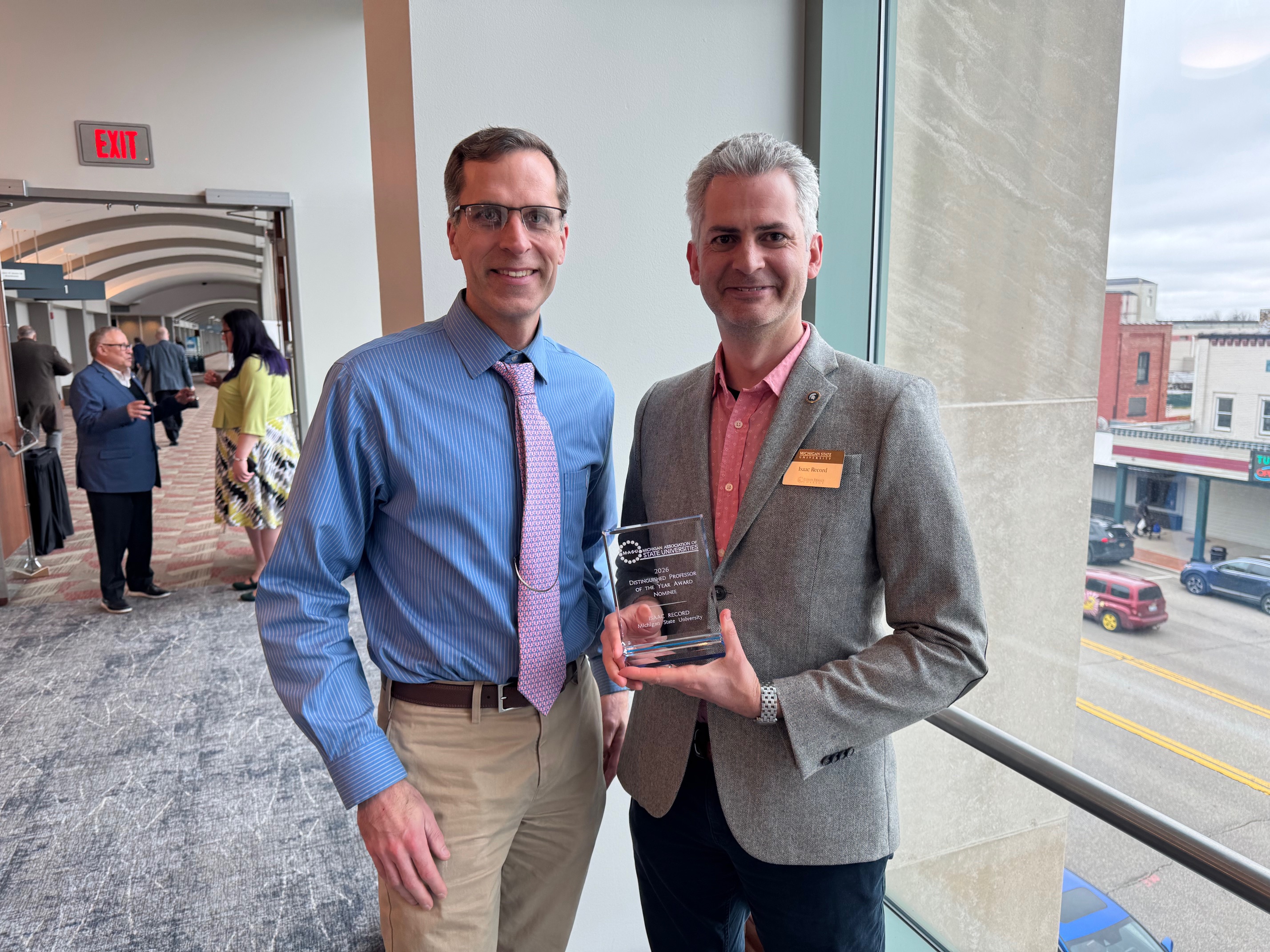 Dr. Ryan Sweeder stands by MSU nominee for Distinguished Professor of the Year Award, Isaac Record