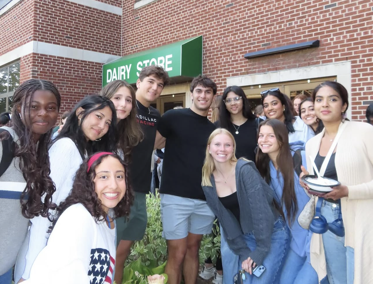 A group of students poses outside the MSU Dairy Store