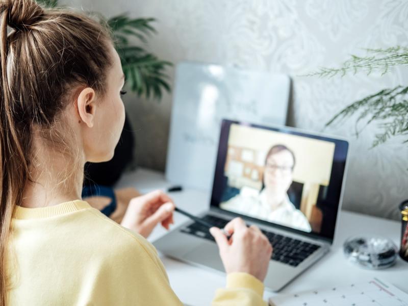 a student has a conversation with an alum