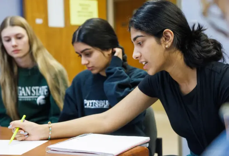 Students working together in a classroom