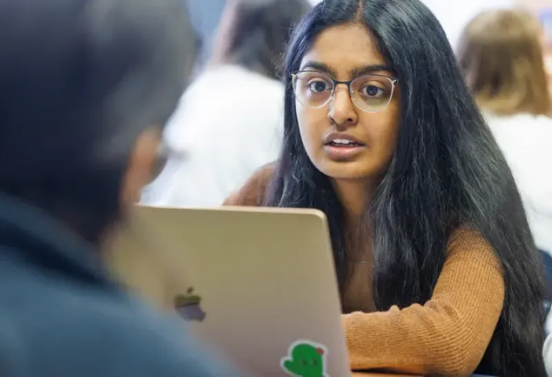Student working on a laptop